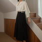 GOLD BUTTON WRAP LONG SKIRT_BLACK - ＠SEOUL